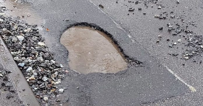Fury as huge pothole in Birmingham shreds tires but council say 'we repaired it in minutes'

